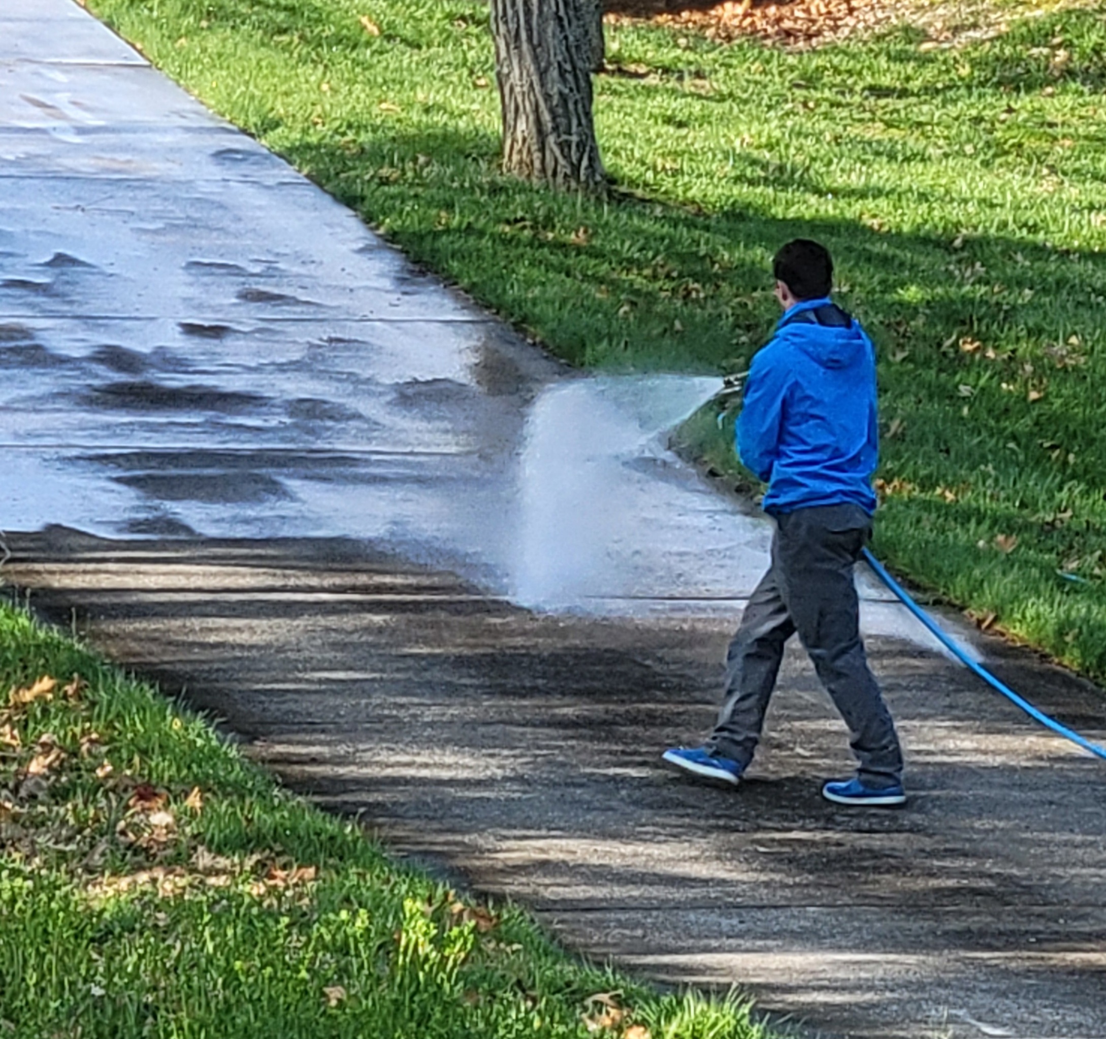 Pressure Washing Concrete Surfaces: Driveways, Walkways, and Patios